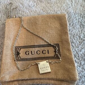 Gucci square trademark necklace.